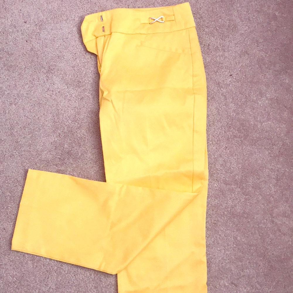 Size 0 dress pants.  Banana yellow.  Worn once.